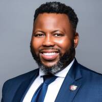 Hon. Kam Buckner